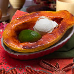 Baked Solo papaya with lime sauce